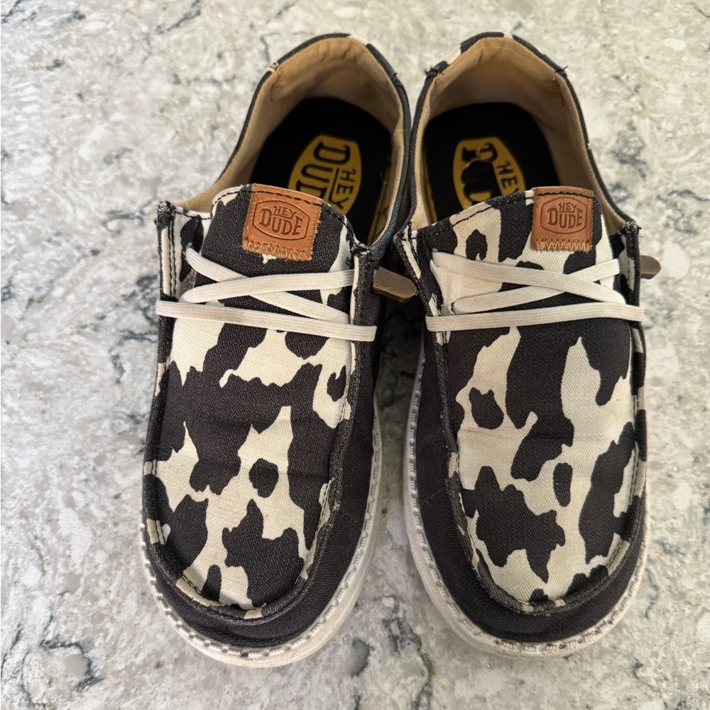 Hey Dude Black and White Cow Pattern Shoes